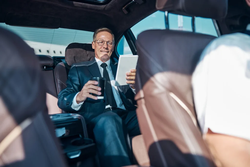 Executive riding in the back of a Seattle corporate car service vehicle